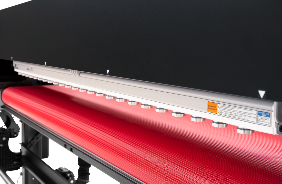 DTF Printer with a black chasis, silver nozzles, and a red platform