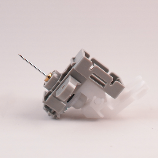 Mimaki DTF printer cartridge valve assembly with gray plastic housing and metal needle for TxF series printers.