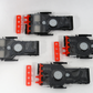 Set of black and red mechanical components on a white background
