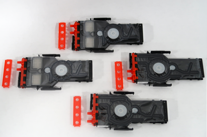 Set of black and red mechanical components on a white background