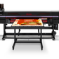 Large inkjet printer with a printed product on a white background