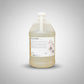 gallon jug of yellow liquid. Jug has a white label that reads "excel ink wash."
