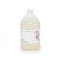 clear gallon jug with a clear liquid inside. White label reads "kiwo clean degreaser 1:50 concentrate"